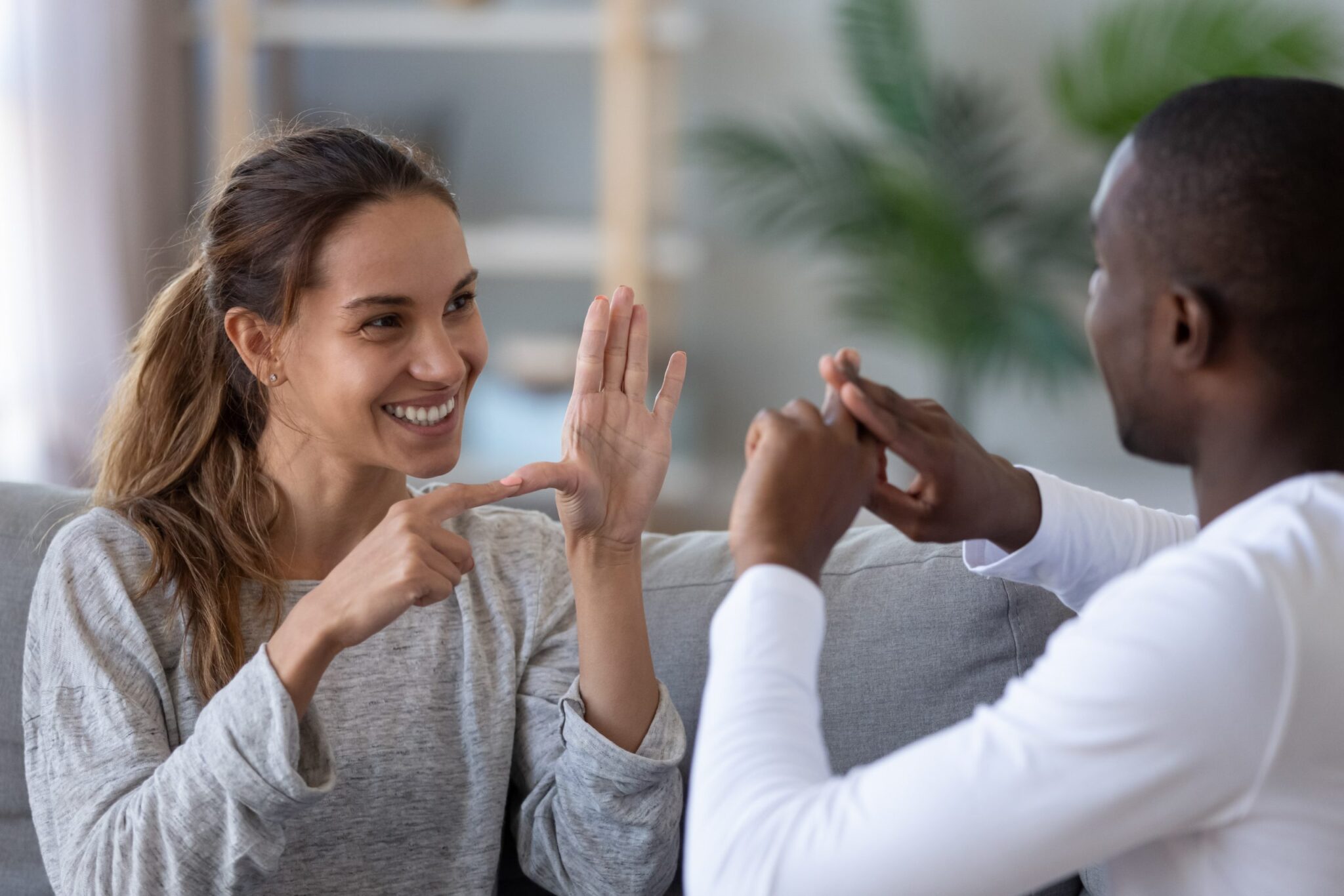 deaf people talking with sign language