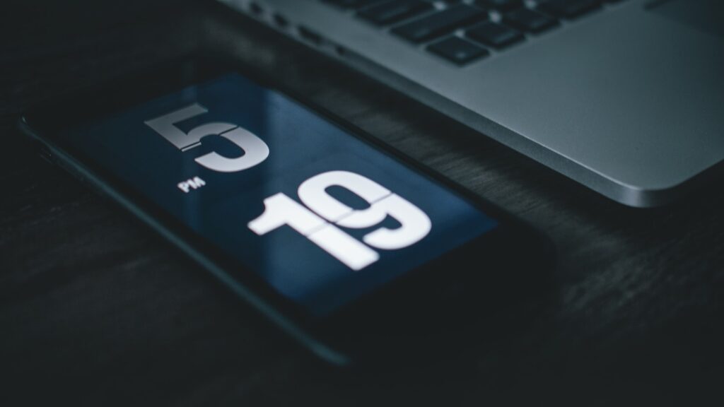 picture showing telephone showing 5:19 PM